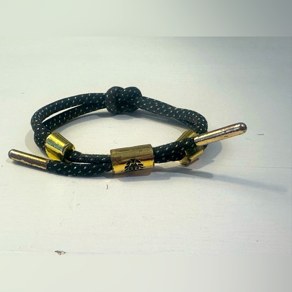 Rastaclat Convergents Black Knotted Lace Bracelet with Gold Lion Logo